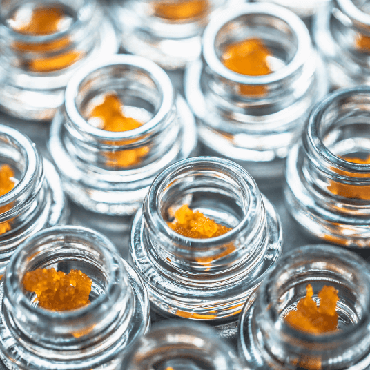 Small jars containing cannabis extract
